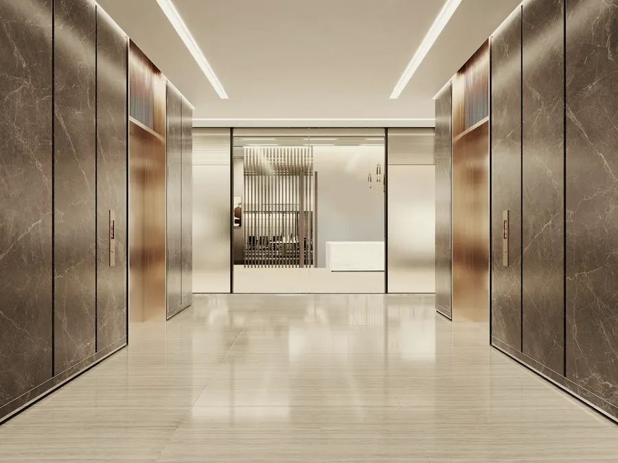 A modern lift lobby with marble and glass